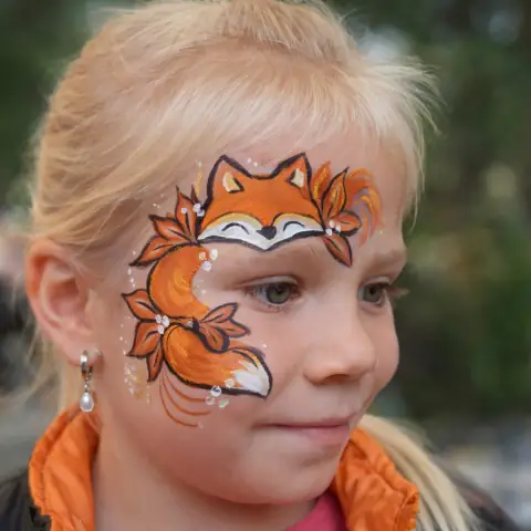 Fox painted on a girl's face