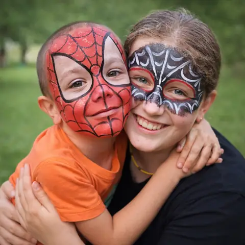 Children with Spiderman face designs